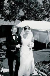 Bride and dad walking down the aisle.